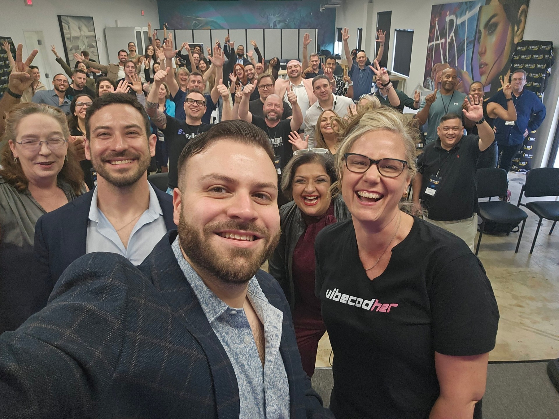 Stefan Ciancio taking a selfie in front of the cheering year-one crowd at Epic Webinar Summit