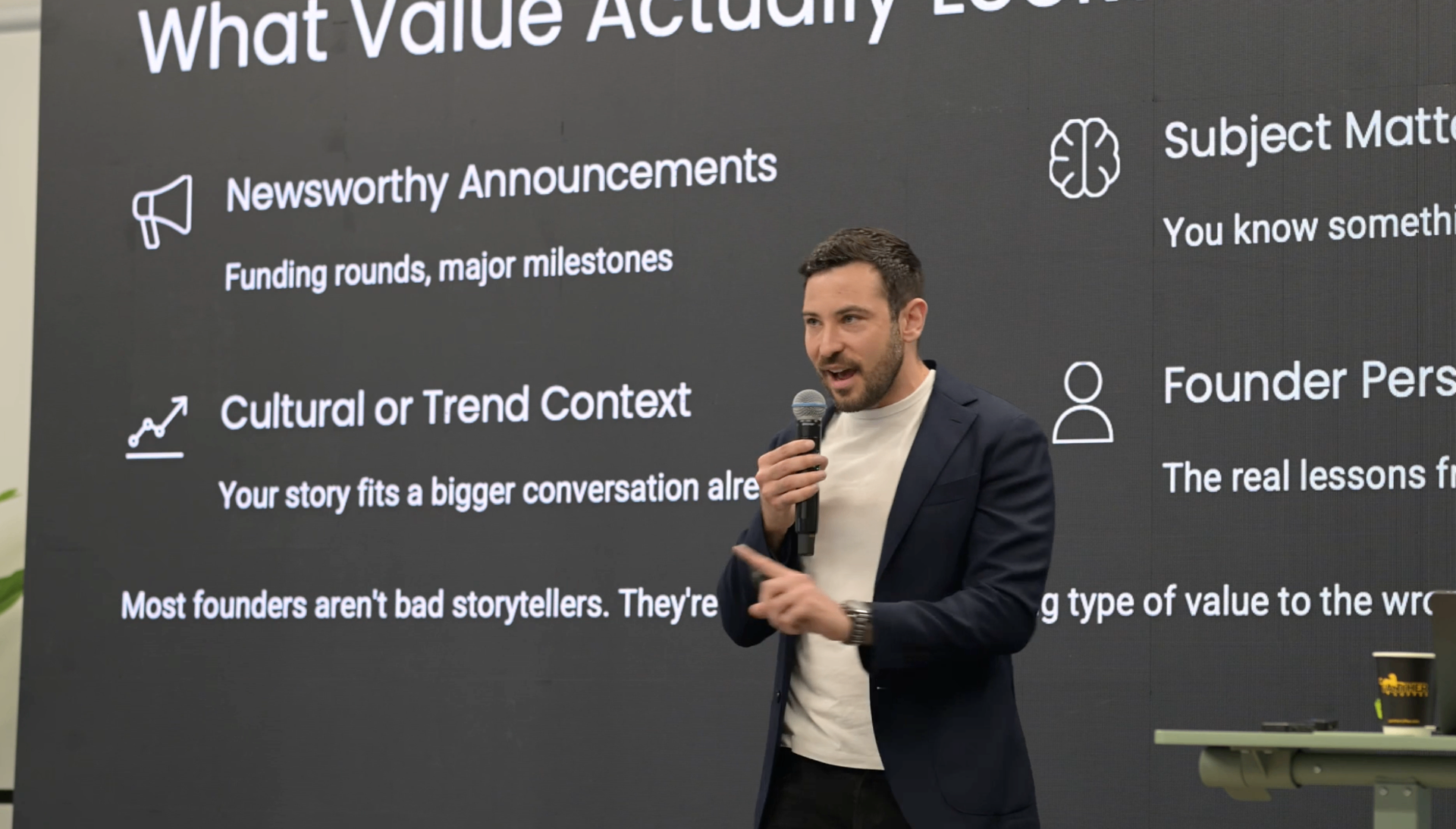 Zach Schleien speaking on stage at Epic Webinar Summit